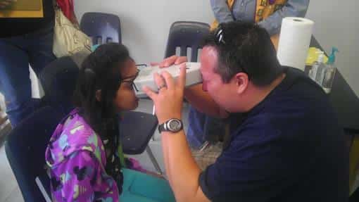 Stephen Gives An Eye Exam – West Plano Lions Club Health Clinic